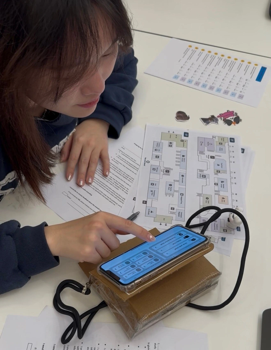 Participant interacting with the AirPal physical prototype
